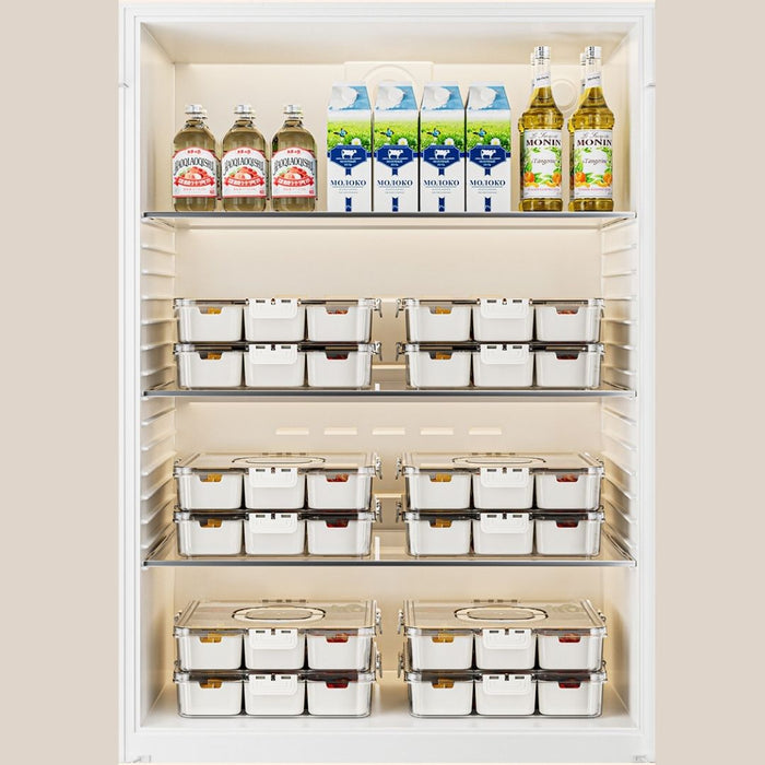 Multiple pantry food storage containers neatly organised inside refrigerator shelves