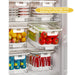 Refrigerator containers neatly organised inside fridge shelves