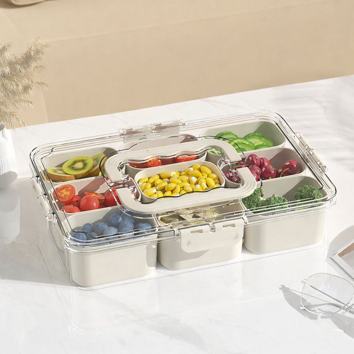 Plastic food storage container with multi compartments and clear snap-lock lid on kitchen countertop