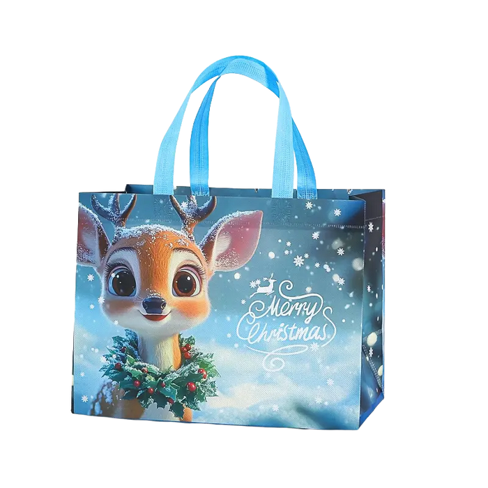 Light blue Christmas reindeer tote bag featuring a cute reindeer, snowflakes, holly and Merry Christmas design.