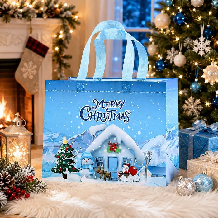 Light blue Christmas tote bag featuring a snowy winter village cottage, Christmas tree, snowman and Santa