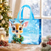 Light blue Christmas reindeer tote bag with cute reindeer, snowy background, holly and Merry Christmas lettering