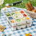 Kitchen food storage container stacked for outdoor picnic with organised fresh ingredients