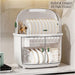 Two tier dish rack designed to fit neatly into kitchen corners with enclosed storage