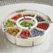 Circular Food Storage Container with transparent locking lid and separated fruit compartments