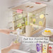 Push-style Drink Dispenser With Tap allowing one-hand pouring inside fridge