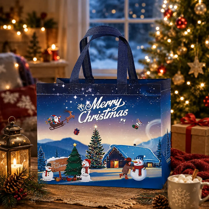 Navy blue Christmas tote bag featuring a snowy winter village, Christmas tree, snowmen and Santa in a sleigh.
