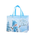 Light blue Christmas tote bag featuring a cheerful snowman in a blue winter hat and scarf, with snowy trees and snowflakes.