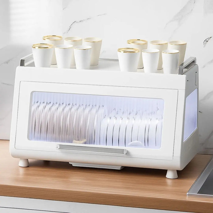 Compact dishrack with transparent door for clear visibility of stored dishes and tableware