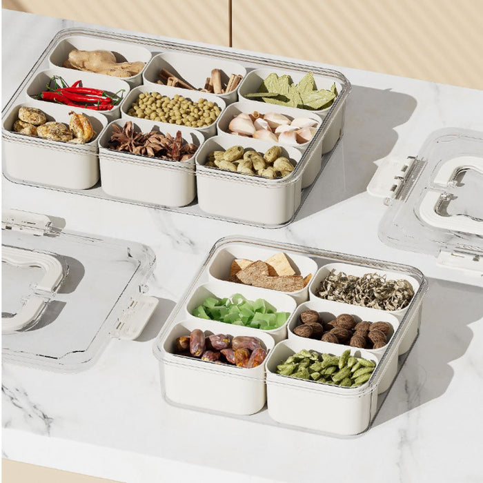 Open compartment food organiser displaying spices and dried ingredients in separate sections