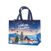 Navy blue Christmas tote bag featuring a snowy winter village, Christmas tree, snowmen and Santa in a sleigh