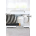 Compact dishrack storing plates, bowls and chopsticks behind a transparent door