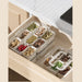 Drawer organisation using stackable multi-compartment plastic container