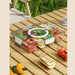 Kitchen storage container used for outdoor picnic with organised fresh ingredients