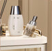 Gold-plated guardrail on top shelf of makeup drawer organiser